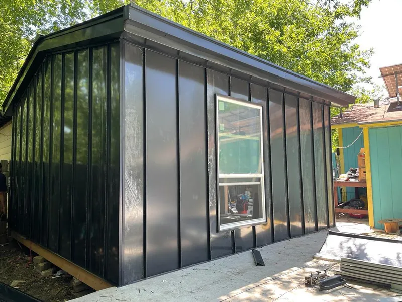 Black standing seam metal wall panels for Roof Inspection in Northfield